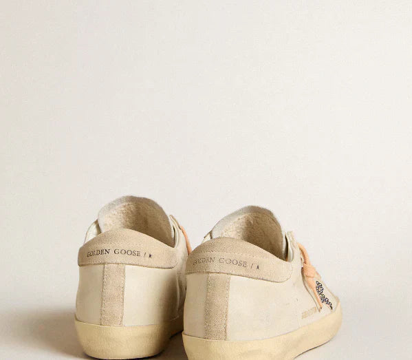 Super-Star LTD in leather with a beige suede star and Swarovski studs