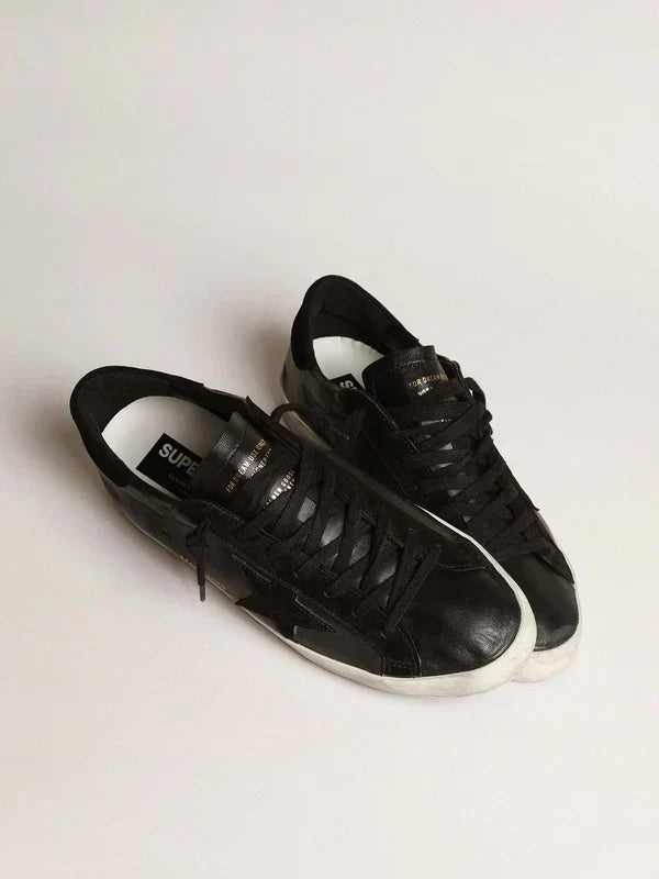 Super-Star in black nappa leather with a suede black star and heel tab 46