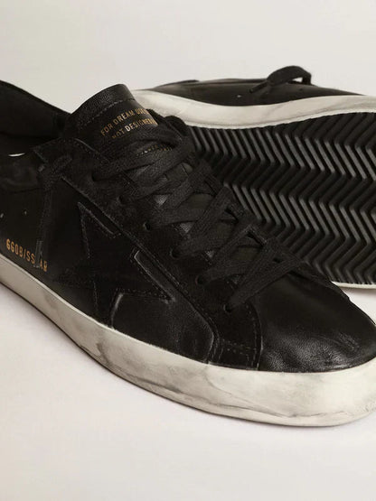Super-Star in black nappa leather with a suede black star and heel tab 46