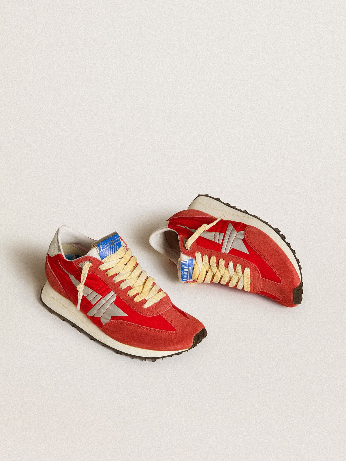 Super-Star with a red upper and a silver star