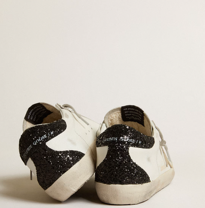 Super-Star Women with a gold star and black glitter reinforcement