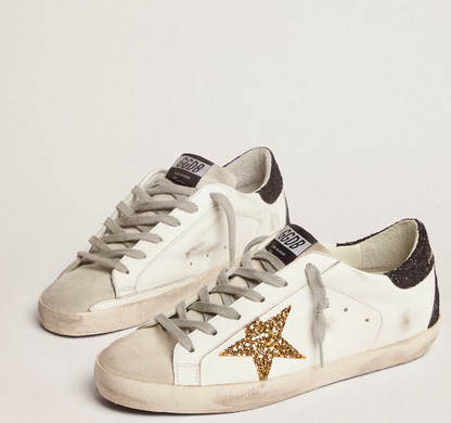 Super-Star LTD with a gold star and black glitter reinforcement