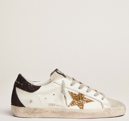 Super-Star LTD with a gold star and black glitter reinforcement